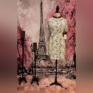 Mint LuLaRoe dress with leaf print size M.